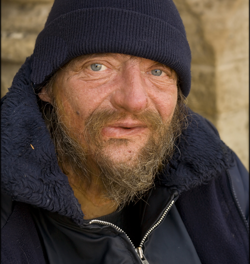 Photo of homeless man in hat