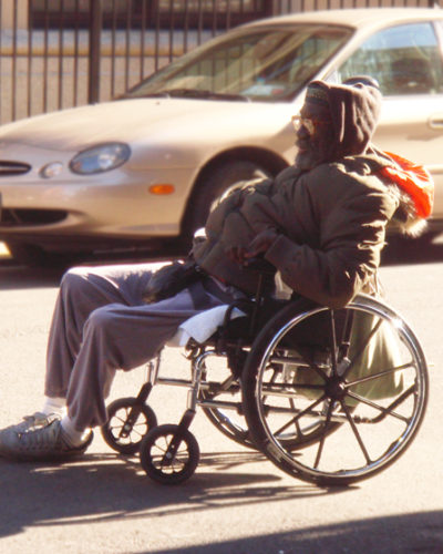 Photo of homeless man in wheelchair